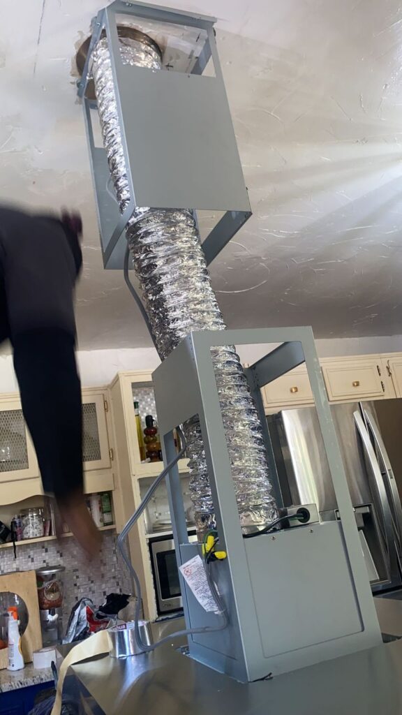 Island hood suspended from the ceiling — Process