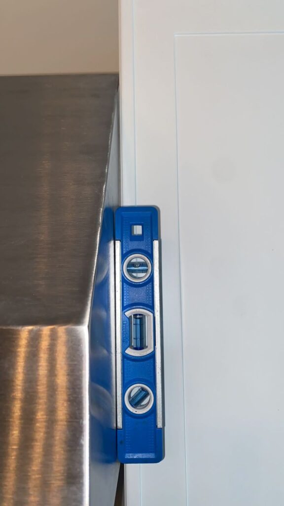 Pro-style hood in a high-end kitchen — Plumb
