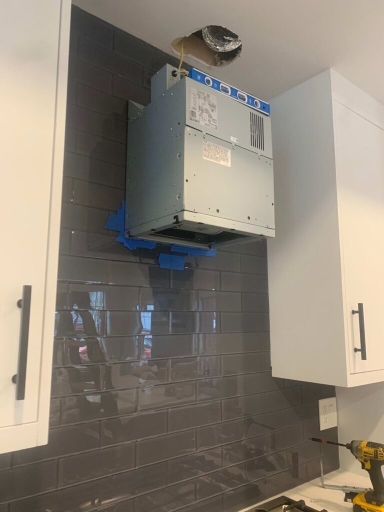 Hood and microwave, both vented outside — Microwave